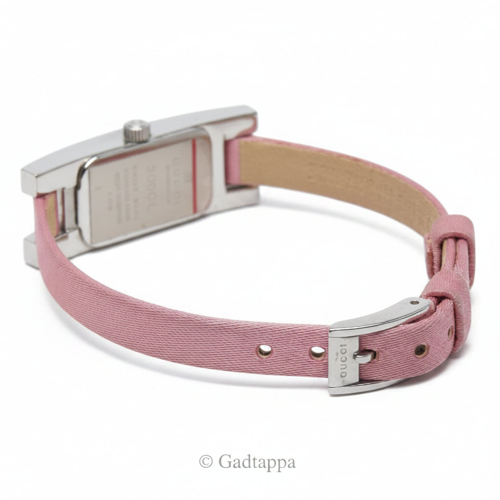 Pink dog collar with silver buckle on a white background