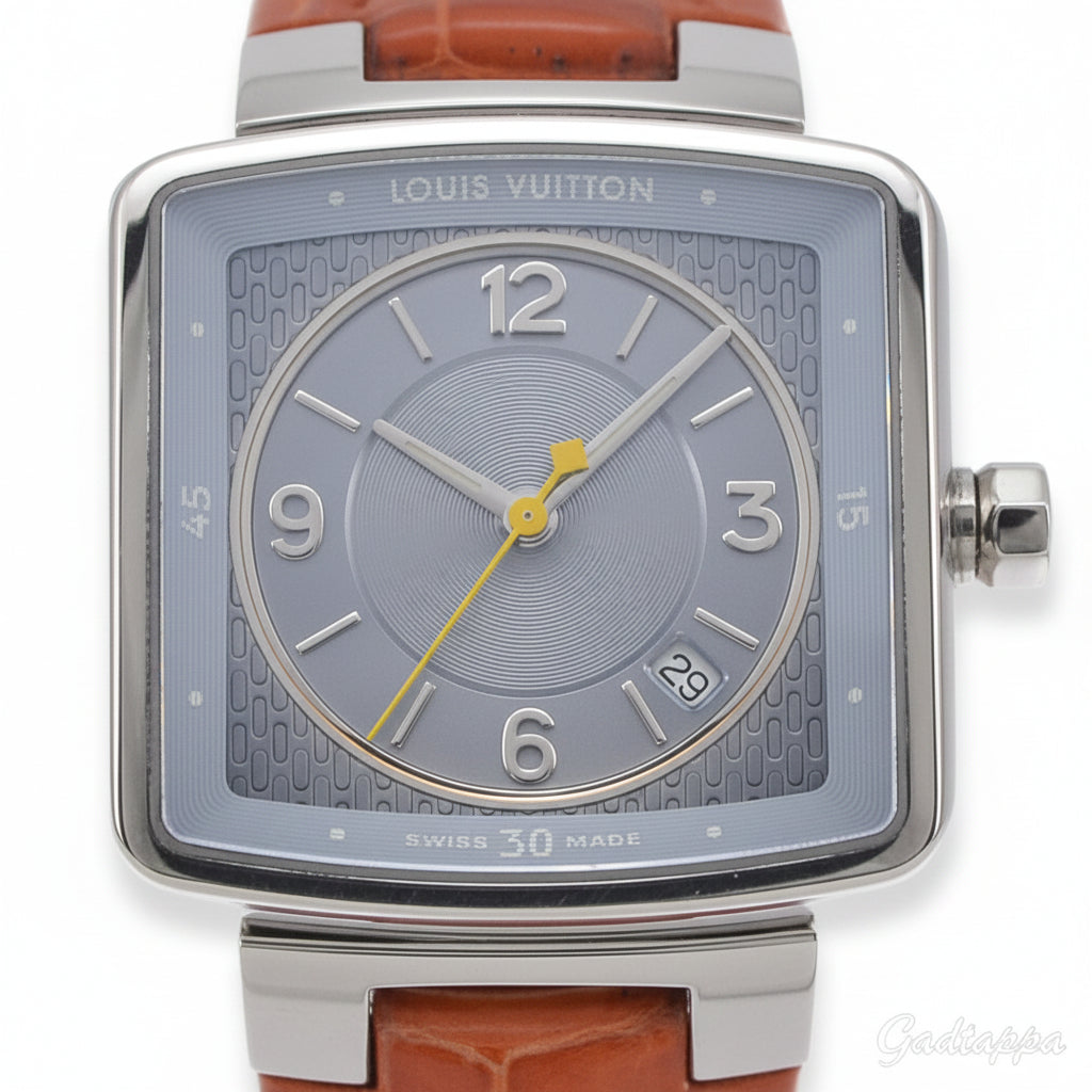 Louis Vuitton watch with brown leather strap and silver case on a white background