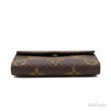 Louis Vuitton dreifach gefaltetes Portemonnaie LOUIS VUITTON Portefeuille Zoe Monogram Canvas Monogram Giant Reverse, goldfarbene Hardware, kompakt, M80725